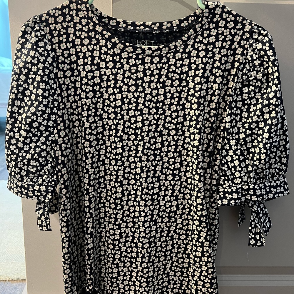 LOFT top. Blue and white flowered. Puff sleeves.